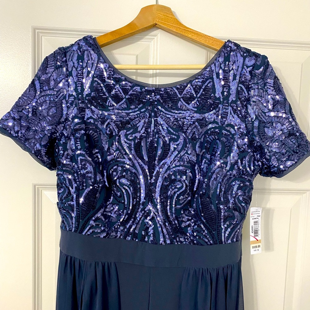 Brand new with tags, size 12. This is a romper dress